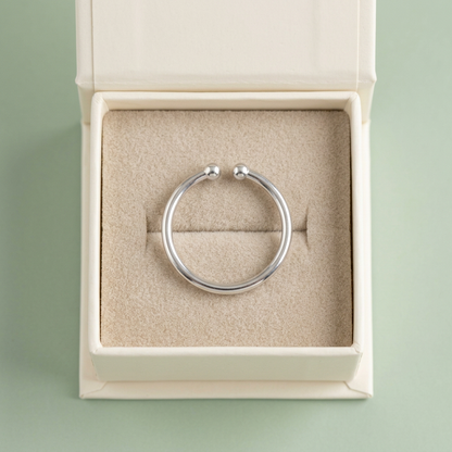 Open ring in unbranded ivory box