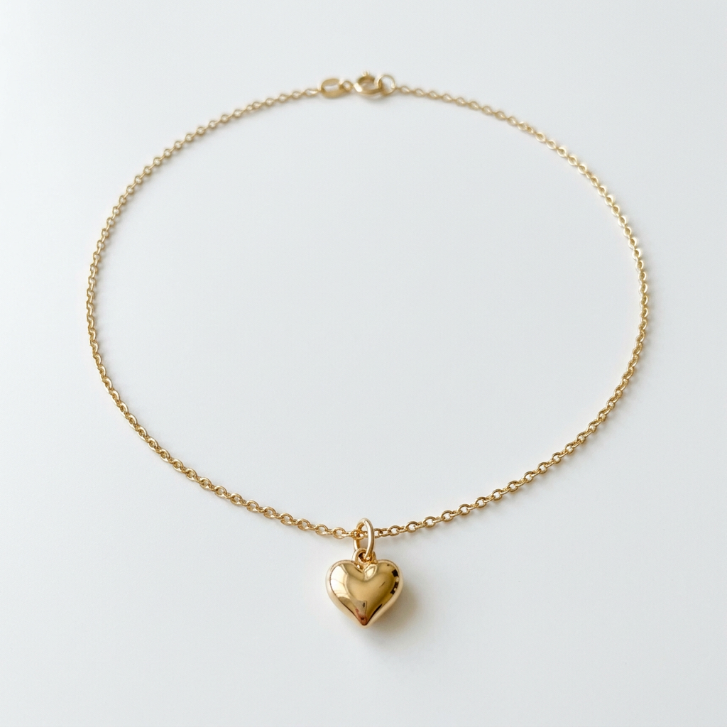 Petite puffy heart pendant necklace on white