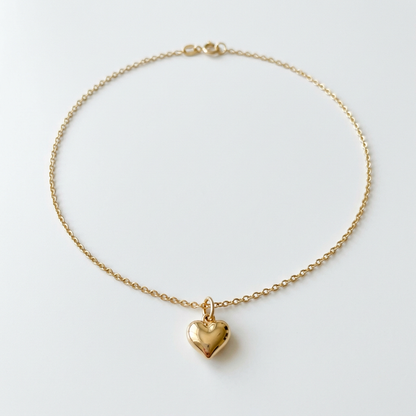 Petite puffy heart pendant necklace on white