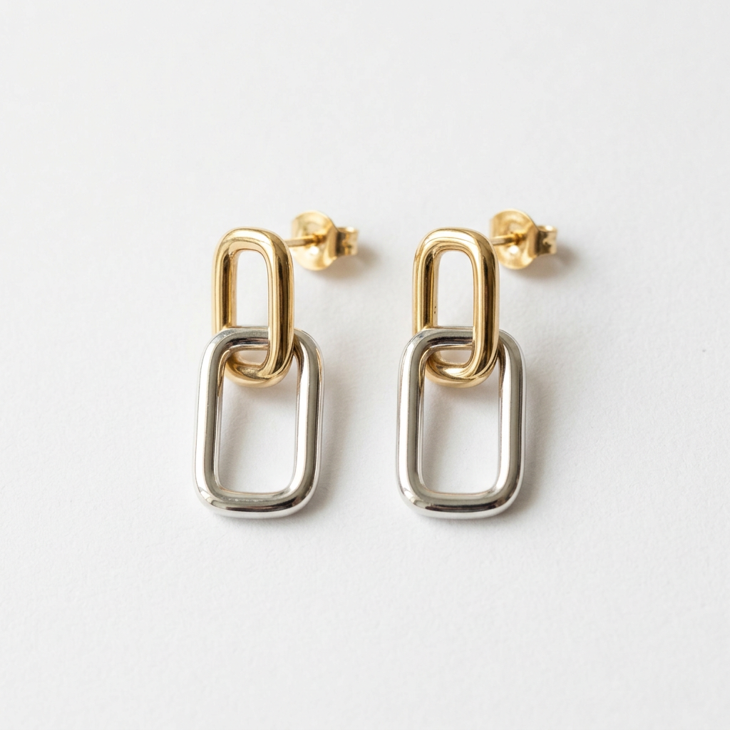 Matching two-tone interlocking rectangle earrings on white