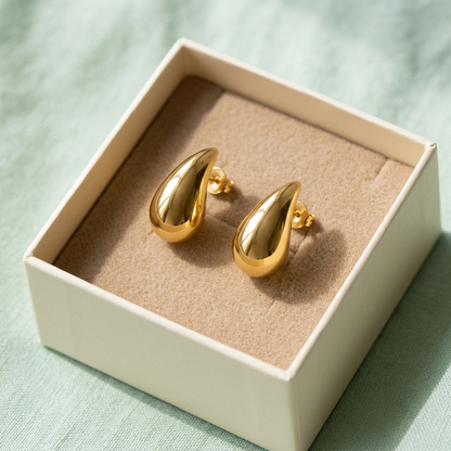 Teardrop earrings in unbranded ivory box