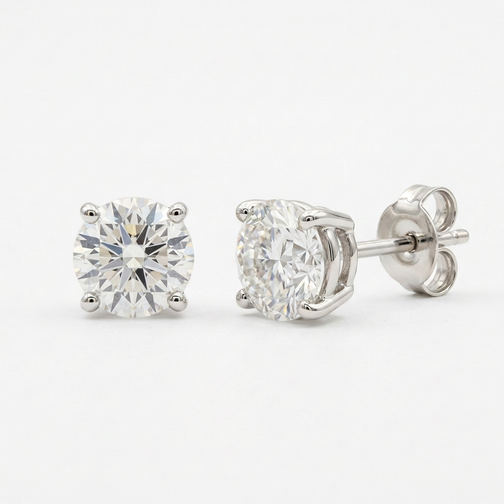 Round solitaire stud earring pair on white without material markings