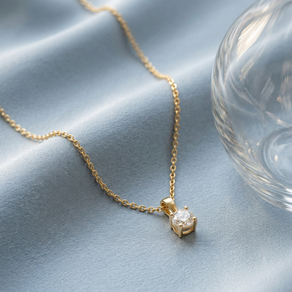 Solitaire necklace on pale blue silk