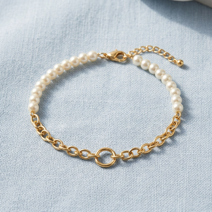 Mixed bead and chain bracelet on pale blue linen